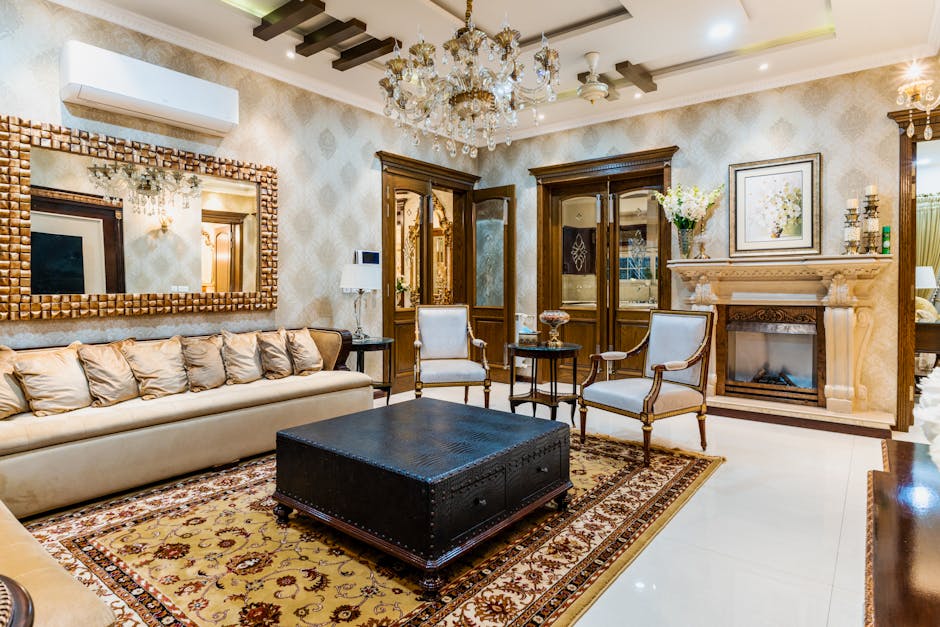 Luxurious living room featuring classic decor, elegant furniture, and a grand chandelier.